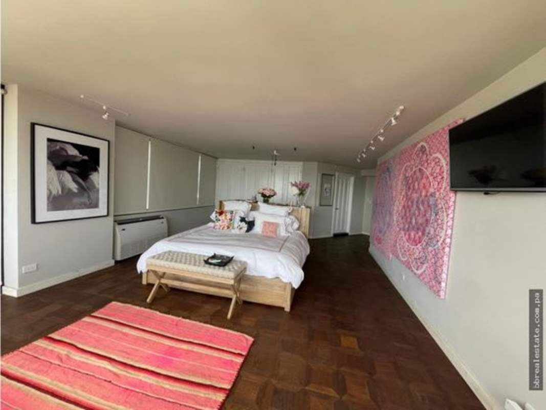 Contemporary bathroom with marble tiles, vanity mirror, double sink in PH Alcazar Panama