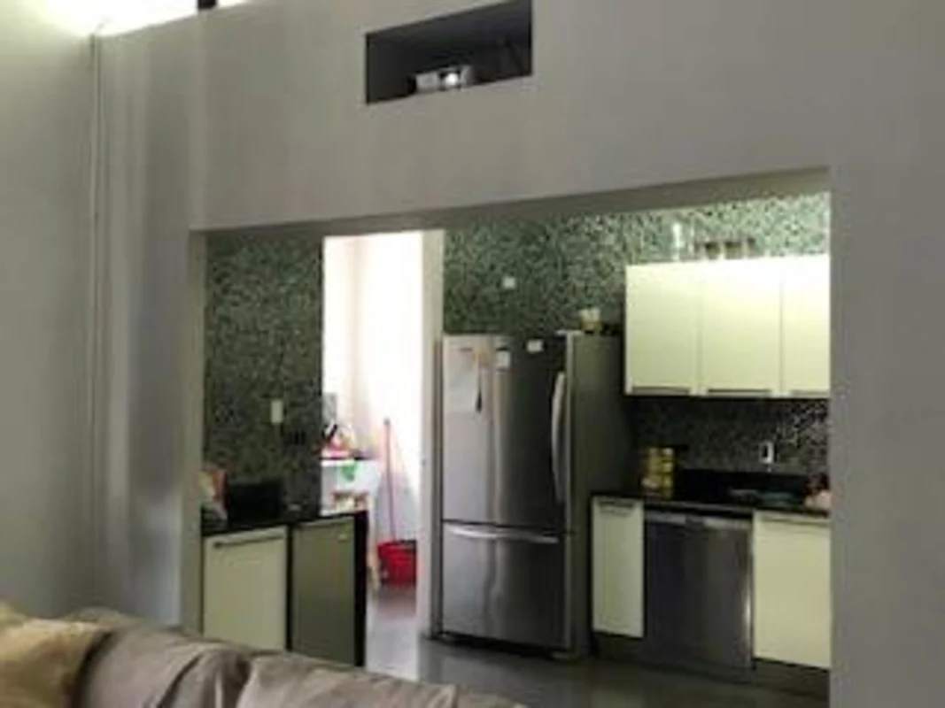 Modern kitchen with mosaic tile backsplash, stainless appliances PH Porta Nova Via Argentina