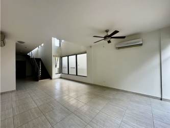 Spacious master bedroom with tiled floors, balcony access and walk-in closet PH Nativa home