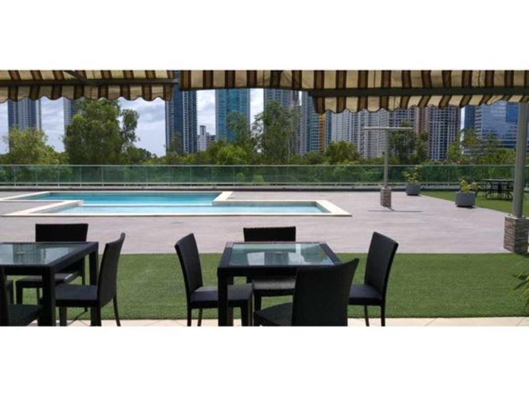 Rooftop infinity pool overlooking ocean and skyline in Costa del Este Panama