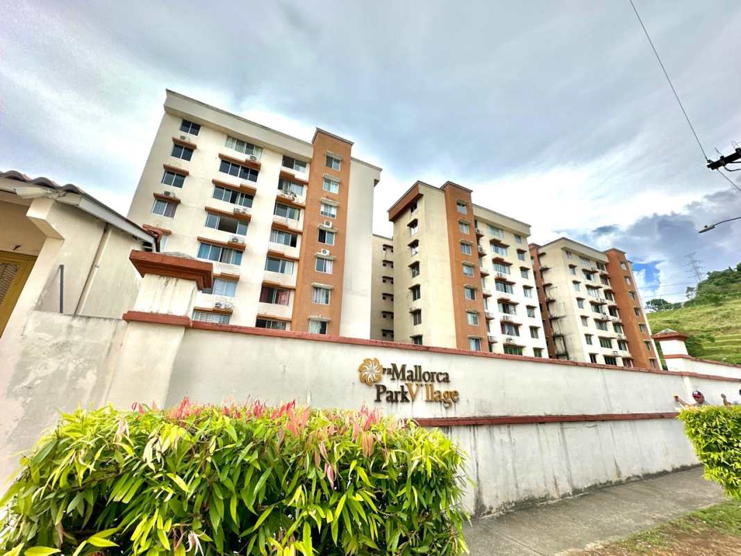 Exterior view Mallorca Park Village multi-story condominiums with balconies in Los Andes Panama