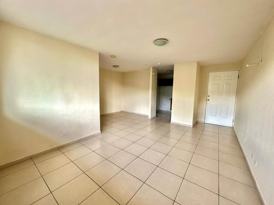 Living area tiled with beige tiles and white walls PH Mallorca Park Los Andes Panama