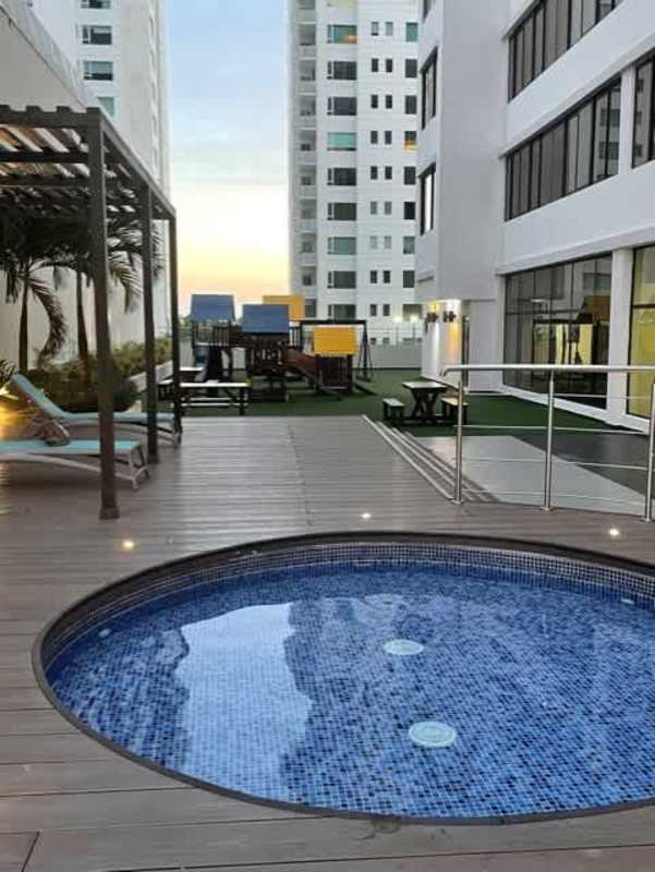 Outdoor jacuzzi playground pergola lounge chairs PH Brisa Marina Costa del Este Panama