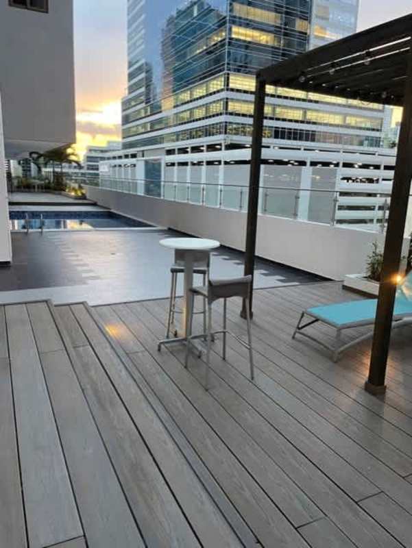 Rooftop terrace with pergola bar pool overlooking Panama city skyline PH Brisa Marina