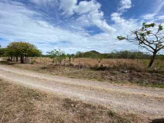 Outlined large farmland adjacent river in Cerro Gordo San José San Carlos