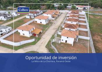 Gated suburban residential community with orange tiled roofs and yards Costa Verde Panama