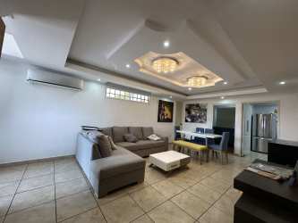 Spacious living room with modern ceiling and lighting in house for sale Arraiján Panama