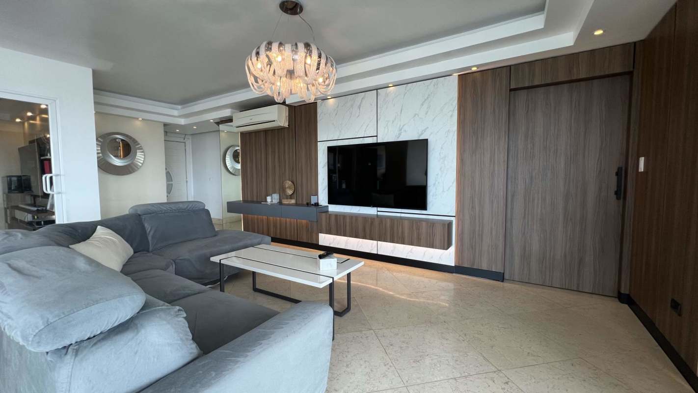 Dining room with marble floor and window light in PH Altos del Parque Panama City