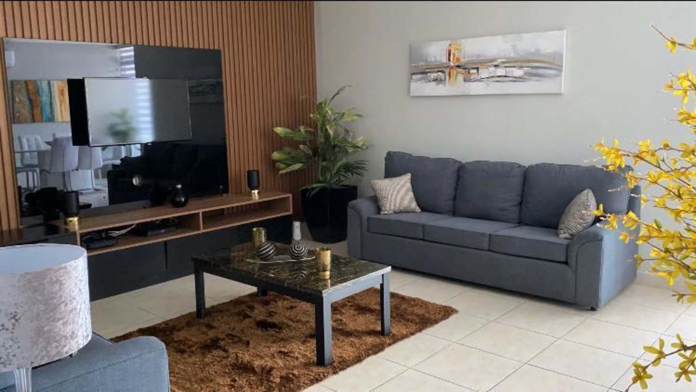 Large bright living-dining room balcony access PH Bella Vista Park Panama City