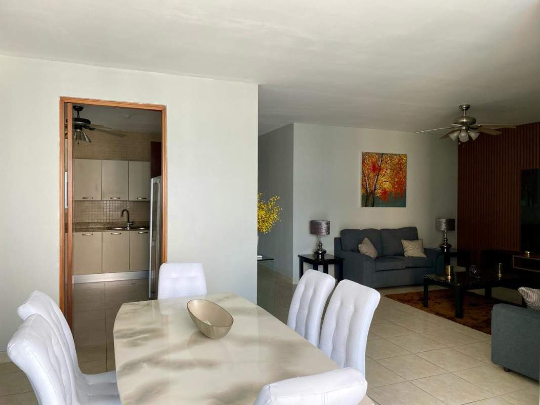 Open plan living dining area neutral tones PH Bella Vista Park Panama apartment