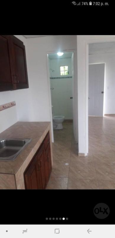 Small outdoor laundry space with sink in residential rental San Miguelito Panama