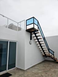 Modern staircase with glass railing tile floor private rooftop PH Founders Panama