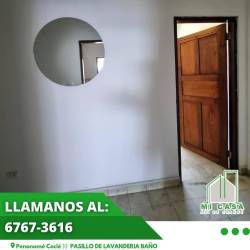 Exterior view plaza signage ample sidewalk parking Penonomé Panama