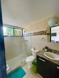 Large swimming pool with palm trees and gardens at Brisas de Coronado Coronado Panama