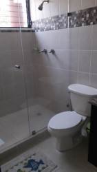 Bedroom loft with large floor-to-ceiling windows and vaulted ceiling Brisas de Coronado