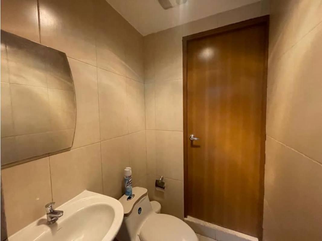 Bright minimalist lobby with marble floor and reception in PH Colores Bella Vista