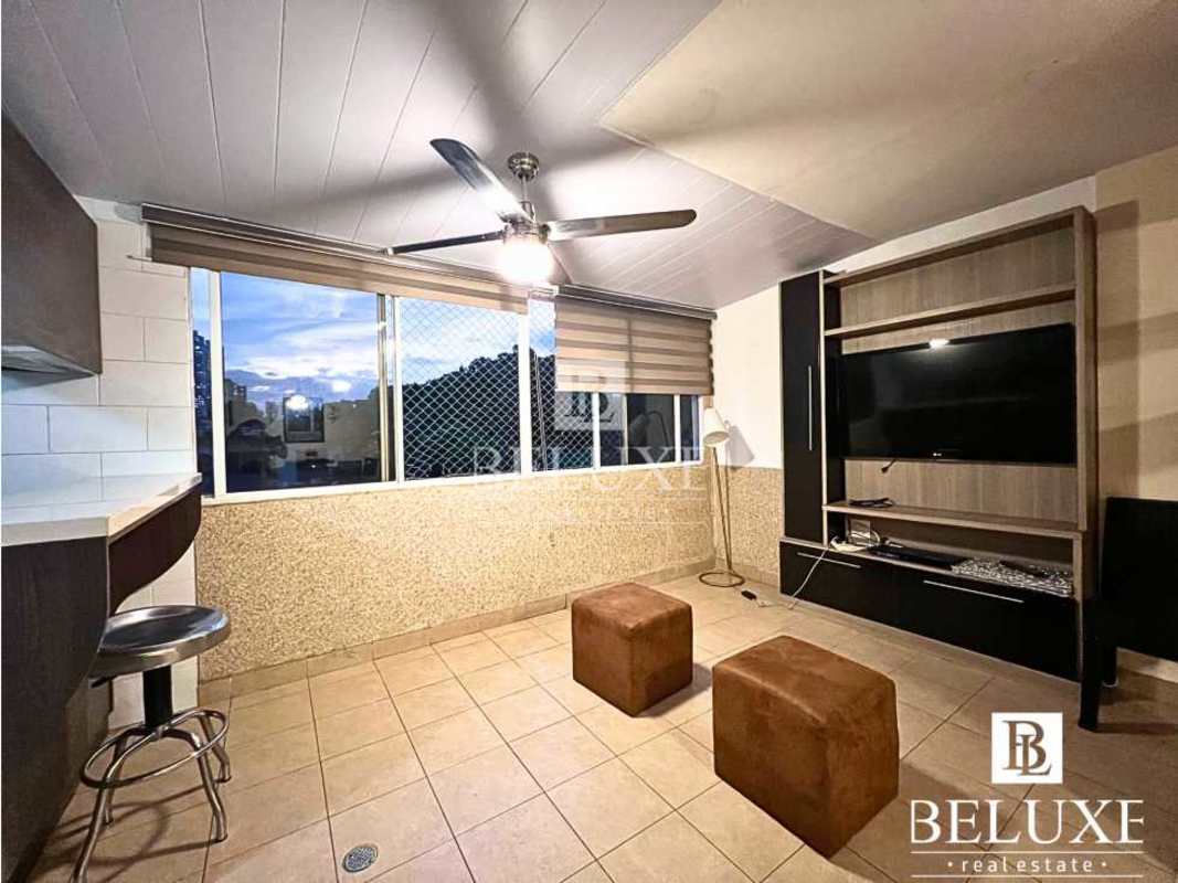 Modern living room with TV cabinet, ottomans, tiled floor and ceiling fan PH Villa Aurora Bethania