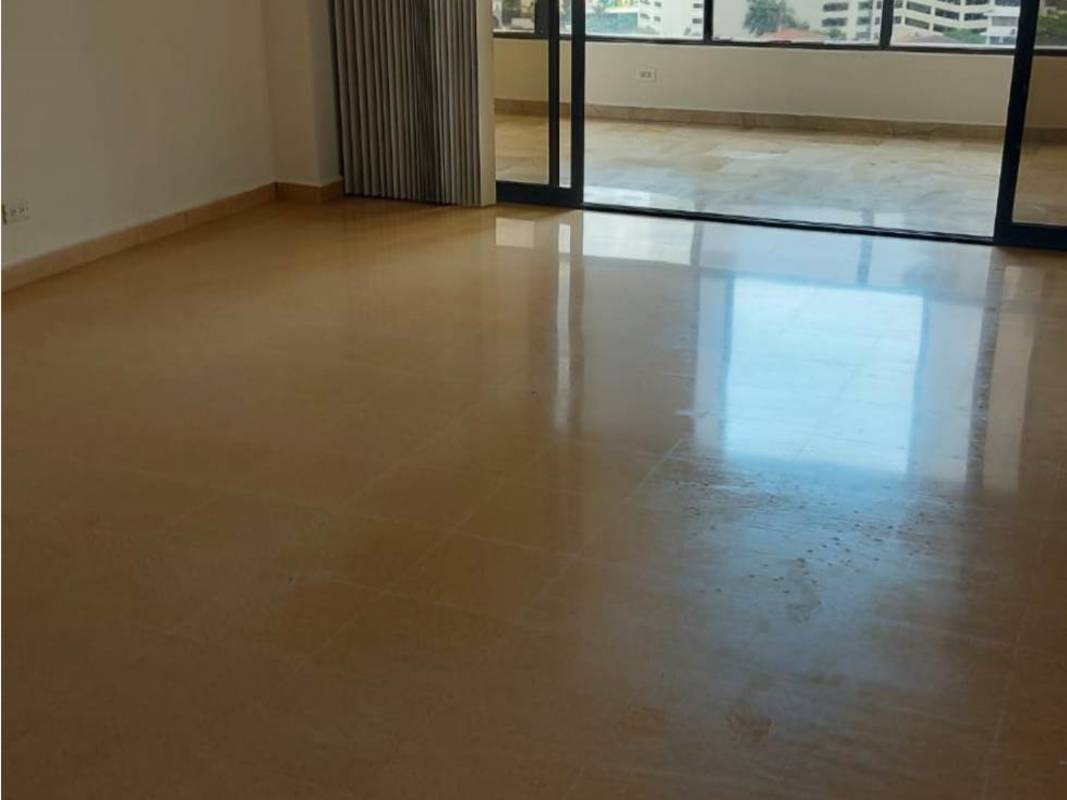 Living room with sliding doors to enclosed balcony city view PH Tiffany Punta Paitilla Panama