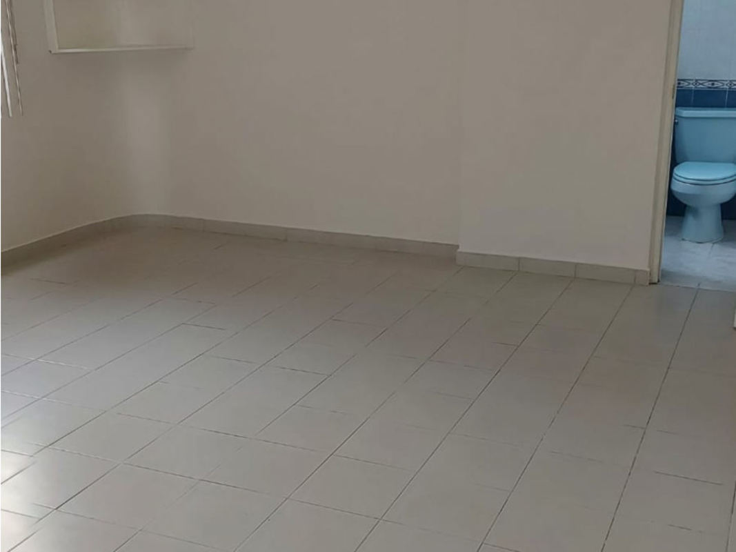 Bedroom with tiled floor ensuite bath window natural light PH Tiffany Punta Paitilla Panama