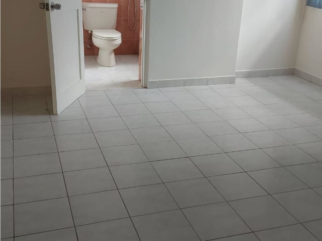 Bedroom with ensuite bathroom tile floor window natural light PH Tiffany Punta Paitilla Panama