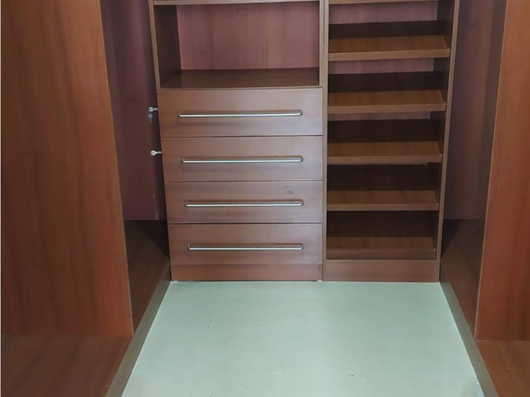 Wooden closet built-in drawers open shelves PH Tiffany Punta Paitilla Panama apartment