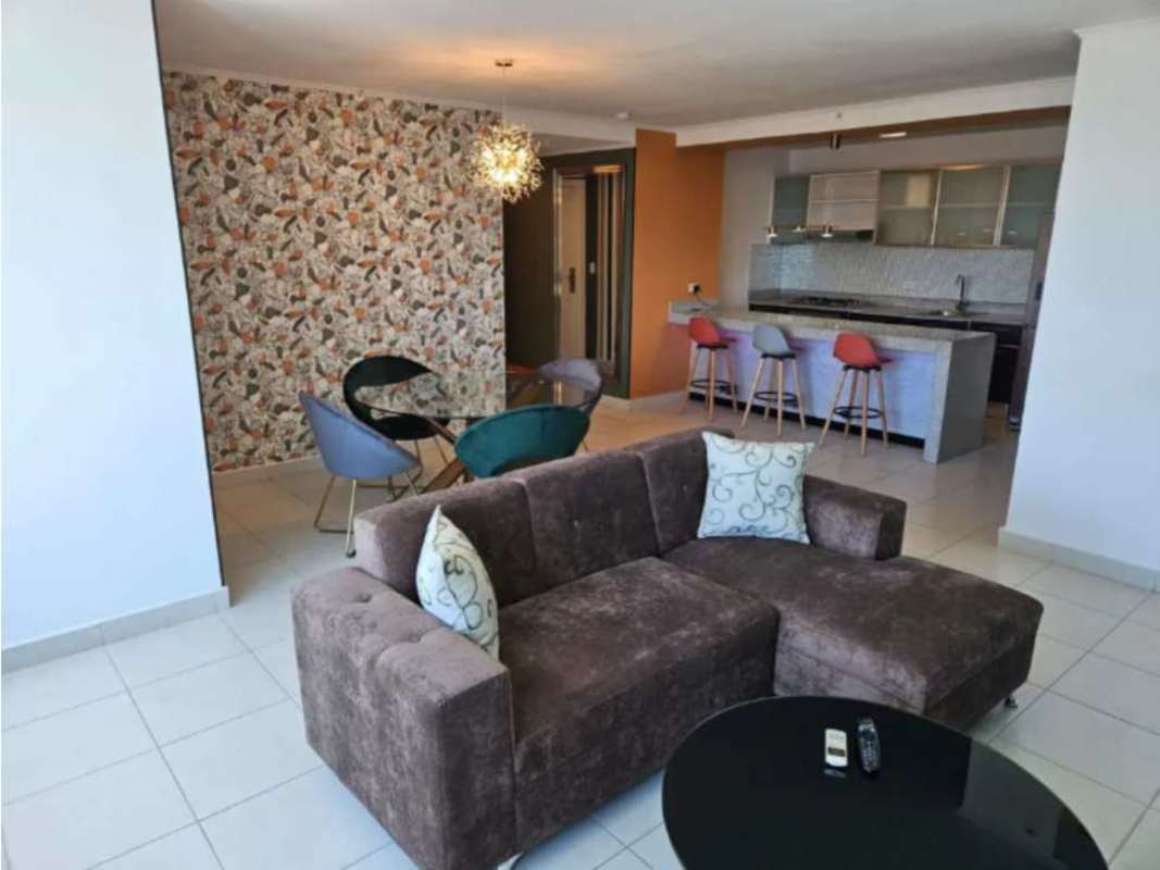 Open layout with sectional sofa, dining and kitchen island, PH Miro El Cangrejo