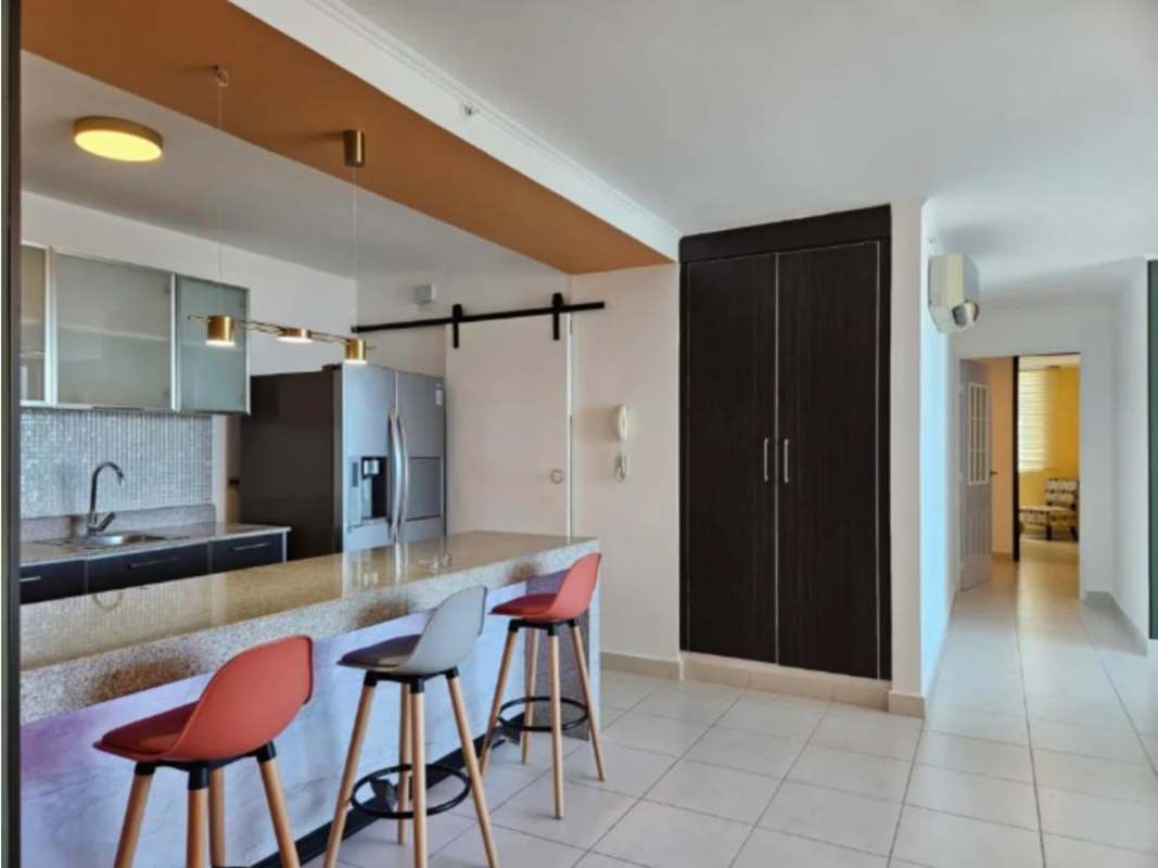 Elegant kitchen with granite island and mosaic backsplash in PH Miro El Cangrejo Panama City