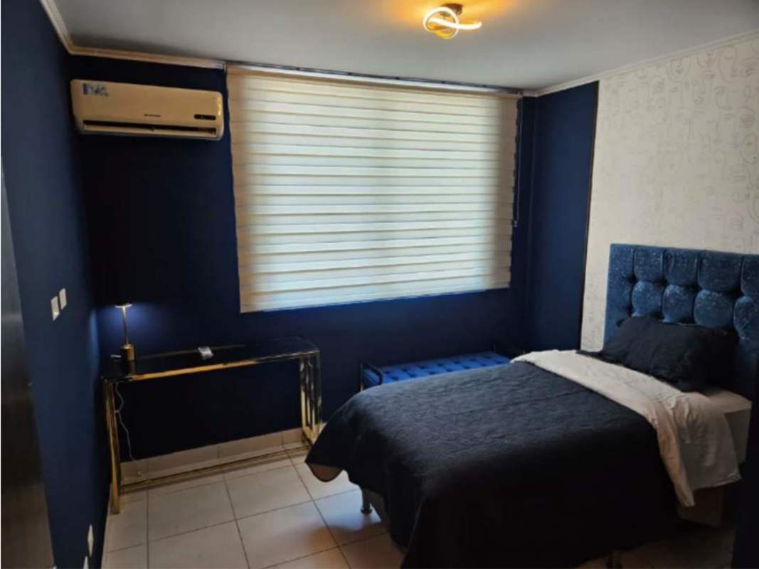 Contemporary bedroom design with blue accent wall, AC unit, in PH Miro El Cangrejo Panama
