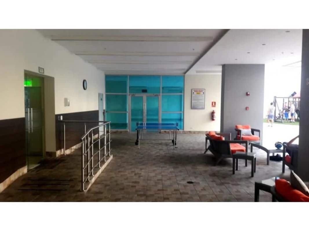 Indoor social area with ping pong table, seating, view to playground PH Miro El Cangrejo