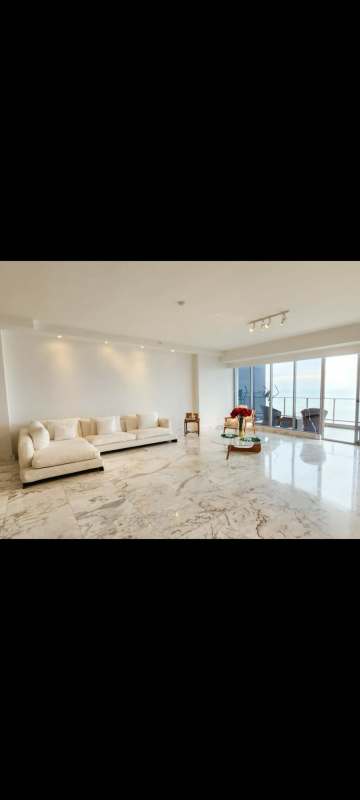 Modern luxury living area with marble floors and ocean views in PH Regalia Costa del Este Panama