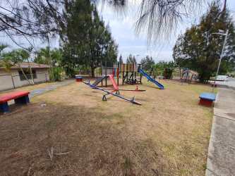 Simple bedroom with built-in closet, desk workspace, tiled floor Colinas del Sol Arraiján