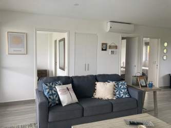 Beachfront infinity pool with gazebo overlooking Pacific Ocean in Punta Chame Panama