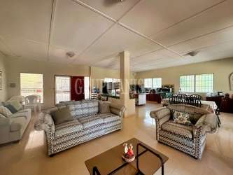 Bright living room connected to terrace in Coronado furnished house rental Panama