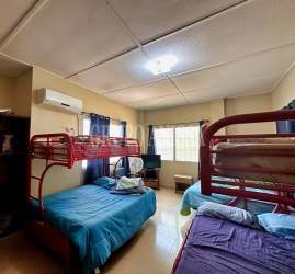 Bedroom with bunkbeds split AC at Coronado beach house rental furnished Panama