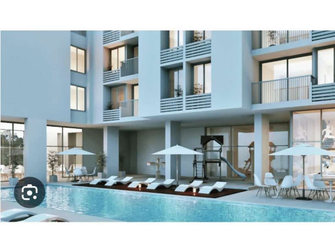 Empty commercial retail space interior with large glass window at Athas City Tower 12 de Octubre Panama City