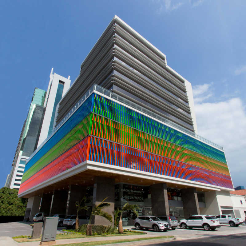 Modern open offices with glass partitions exposed ceiling at PH Kenex Plaza