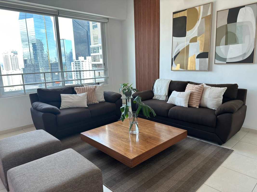Bright living room with city views in furnished apartment PH Vista del Mar Avenida Balboa
