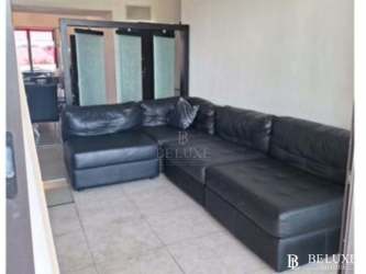 Second terrace overlooking fairways and ocean in beach condo Panama