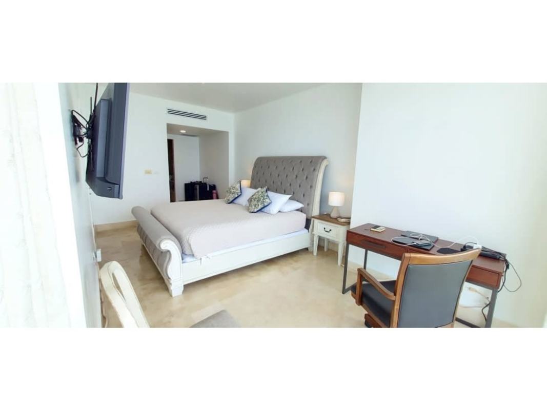 Furnished bedroom with ocean view and walk-in closet in PH YOO Panama tower