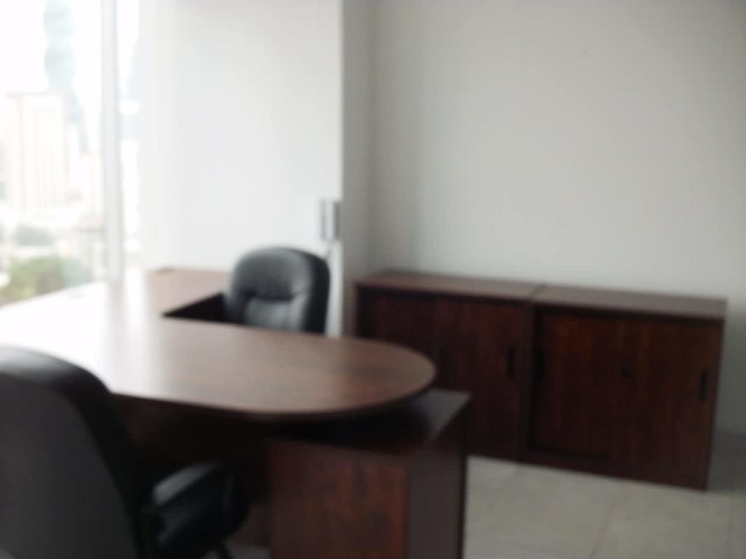 Executive private office with large windows and panoramic city view in Ocean Business Plaza, Panama