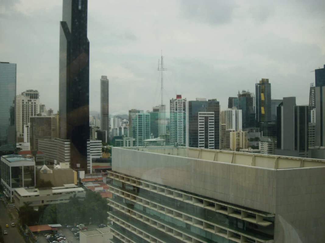 Aerial view of Panama City skyline with oceanfront high-rise towers