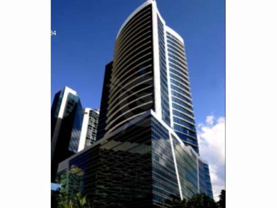 Contemporary skyscraper Ocean Business Plaza in Marbella with glass facade