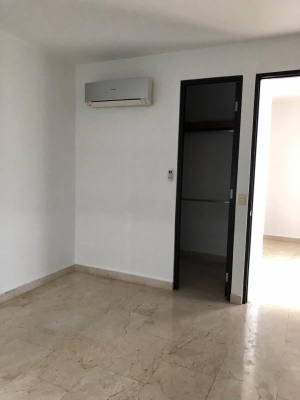 Infinity rooftop swimming pool with panoramic bay and skyline views Costa del Este Panama