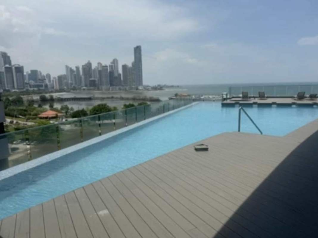 Outdoor jacuzzi spa area overlooking Panama City skyline at PH Yacht Club
