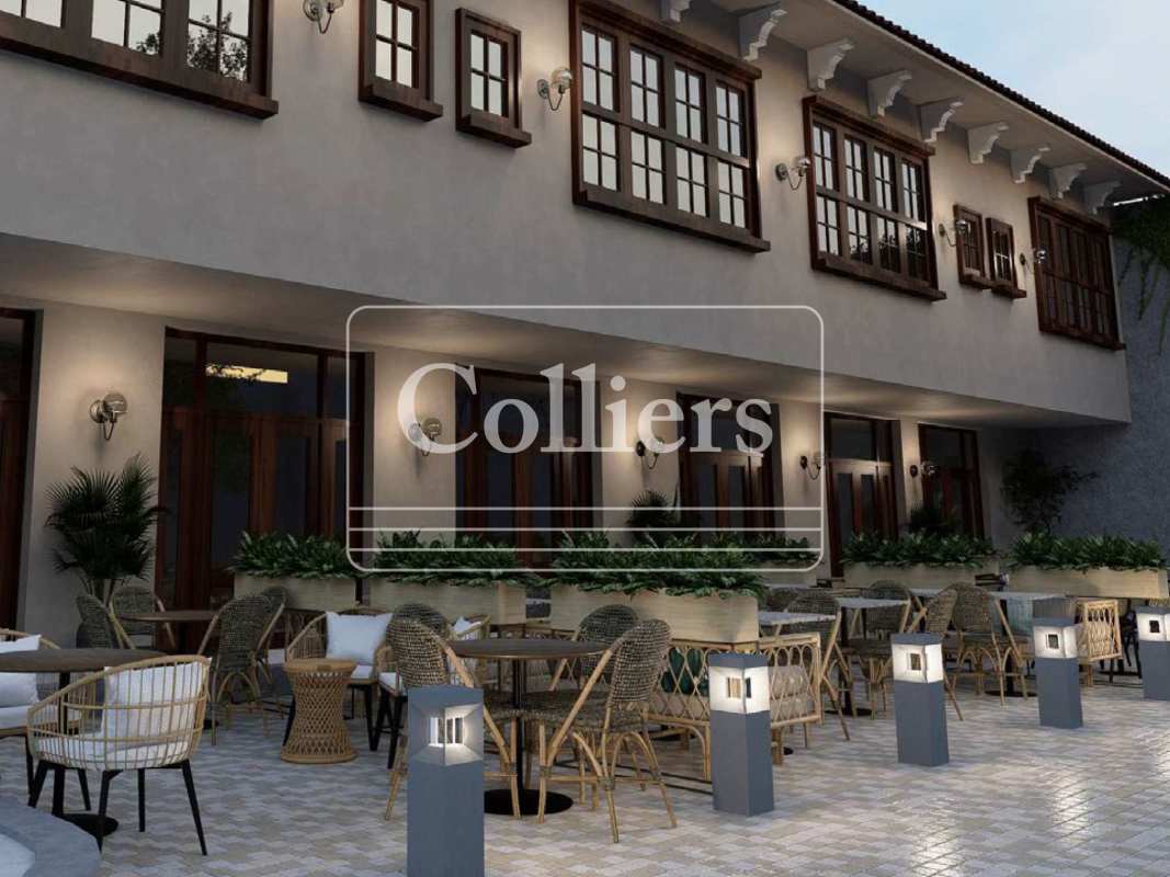 Charming interior rustic dining area with wicker chairs and pendant lighting in historic Casco Viejo Panama