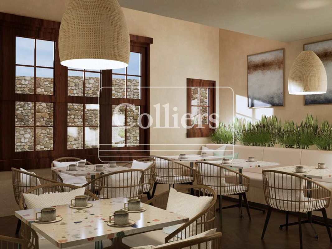 Outdoor commercial patio with tables chairs planters colonial building Casco Viejo San Felipe Panama