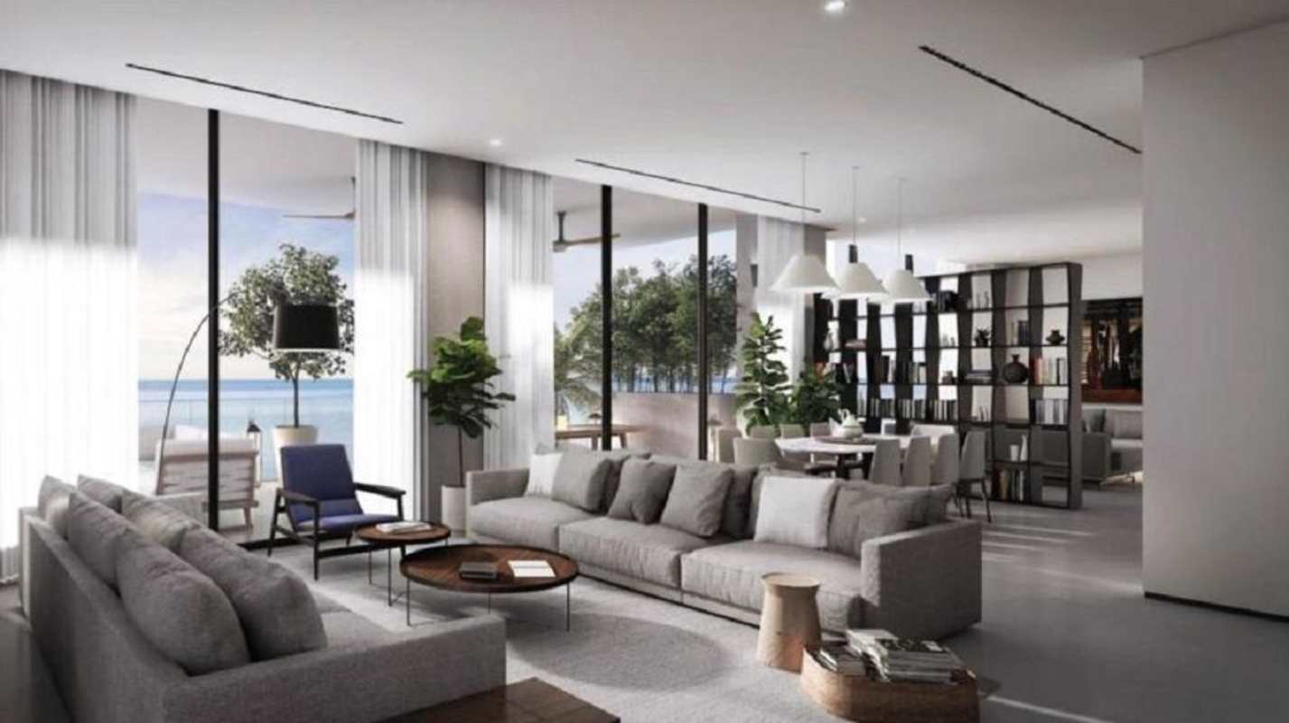 Infinity pool area with lounge chairs overlooking Panama skyline Upper East Tower