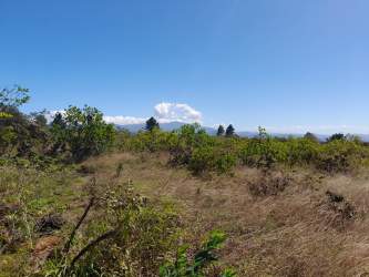 Vacant open field with mountain views in Alto Boquete Panama prime for residential or commercial development