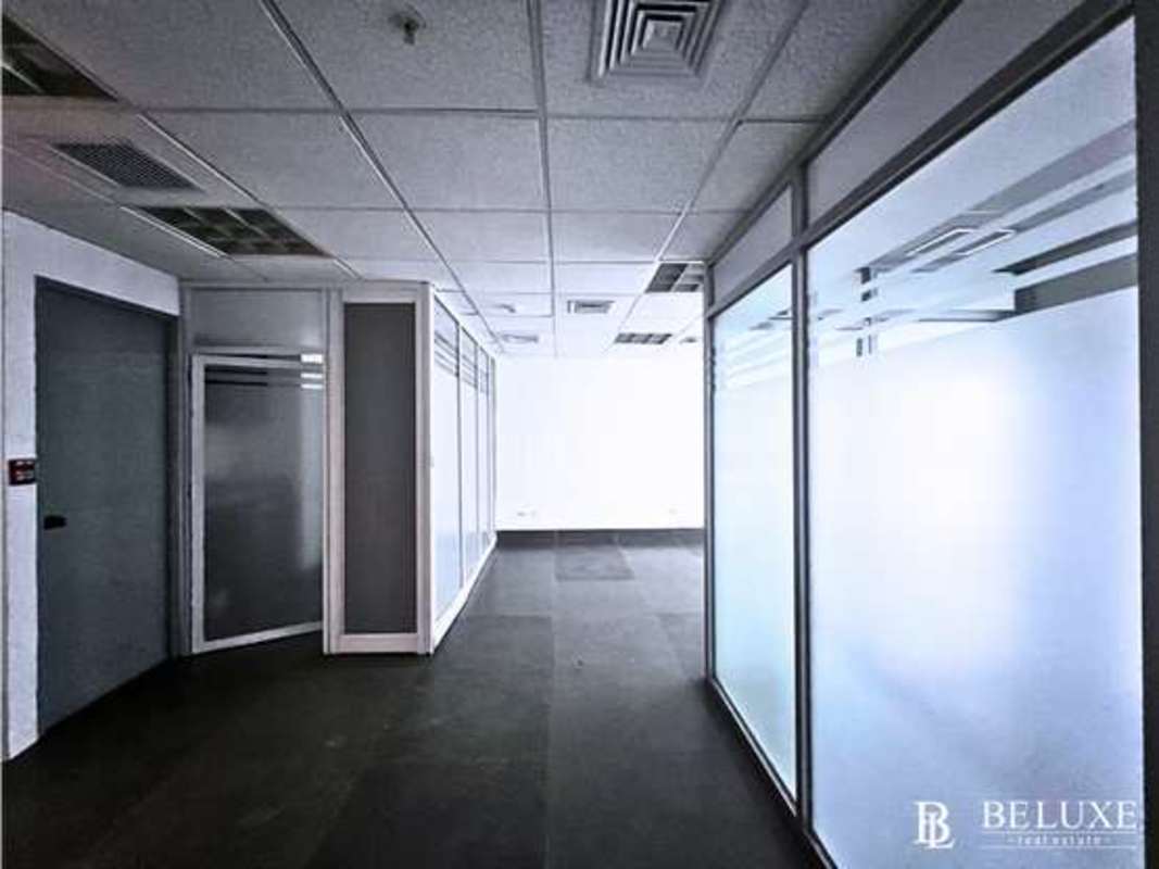 Modern finished office with large window and ceramic flooring in Obarrio Panama City