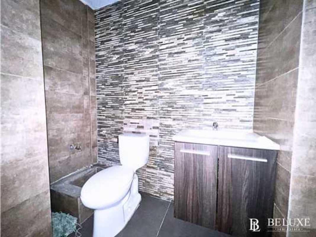 Glass enclosed conference area with LED lighting in Obarrio PH Twist office building Panama City